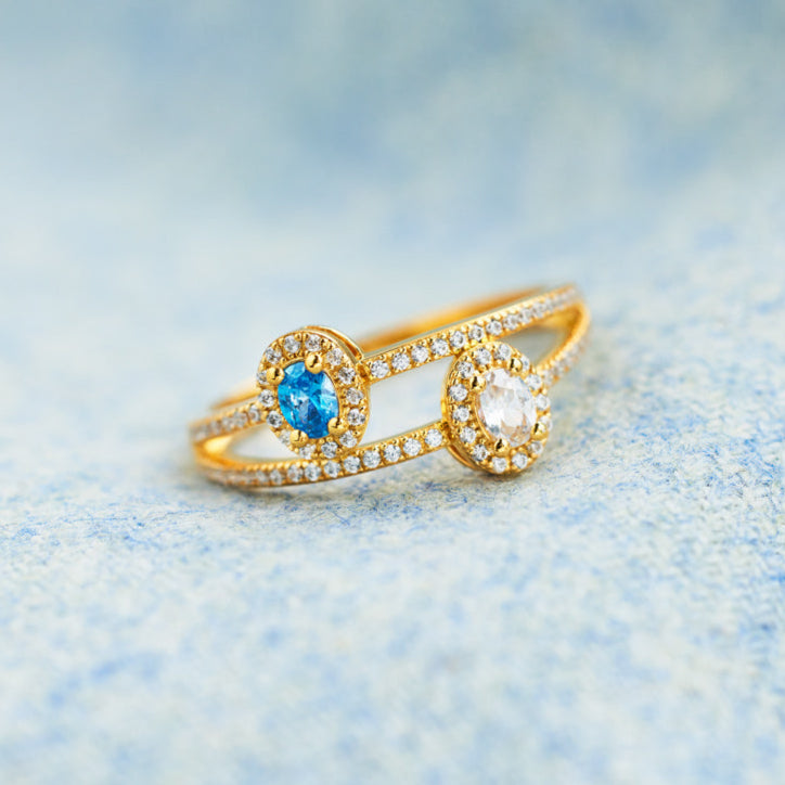 Doppelter Bandring mit zwei Geburtssteinen