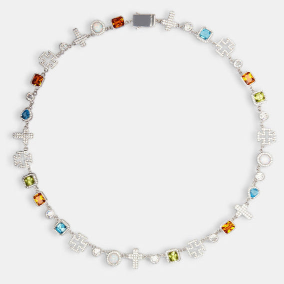 Halskette mit mehreren Edelsteinen und Kreuz