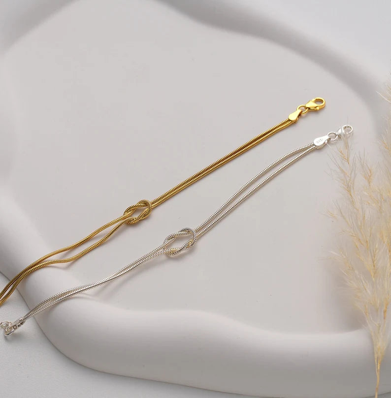 Paararmband aus 18 Karat Gold