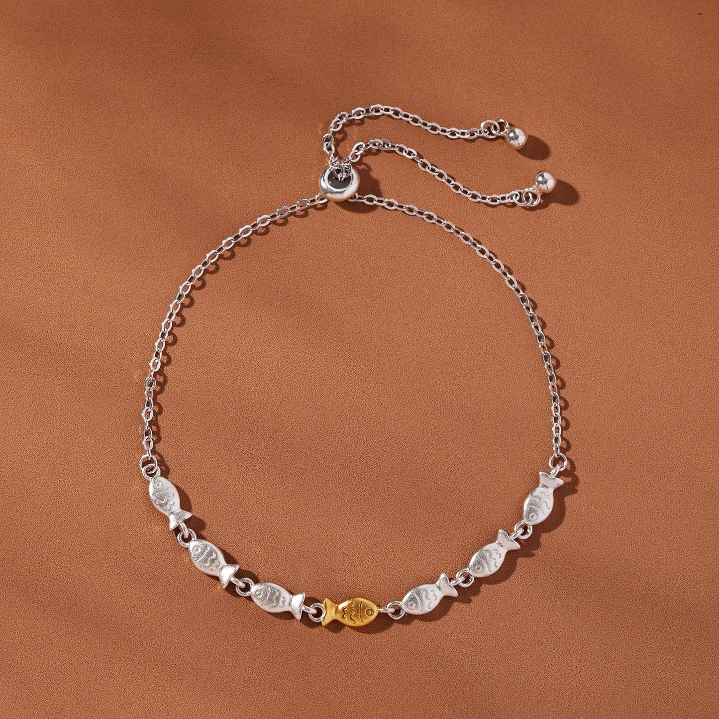 Fischförmiges Armband