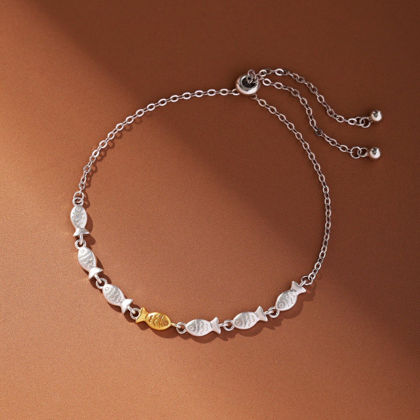 Fischförmiges Armband