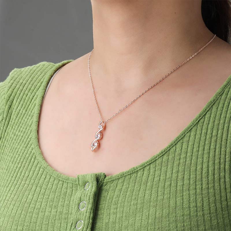 Spiralhalskette mit drei Diamanten
